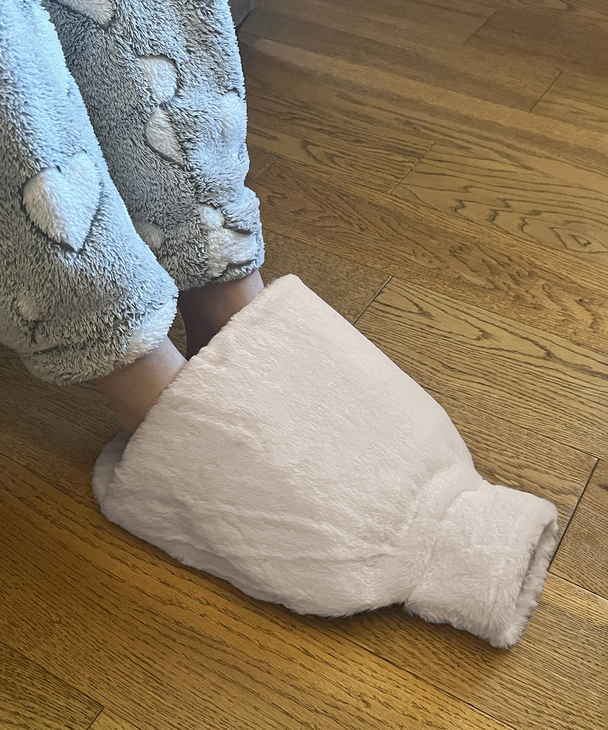 Luxury foot hot water bottle and cover in plush faux fur